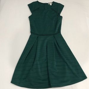 Emerald green skater dress.
